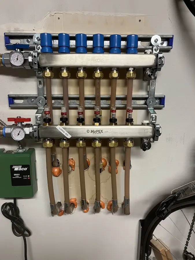 Plumber performing Water Heater Repair at a residential property in Centralia